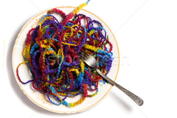 Full plate of melange yarn with a fork Stock photo © mrakor