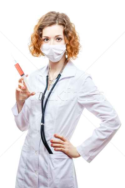 Aranyos vörös hajú nő orvos laborköpeny injekciós tű maszk Stock fotó © mrakor