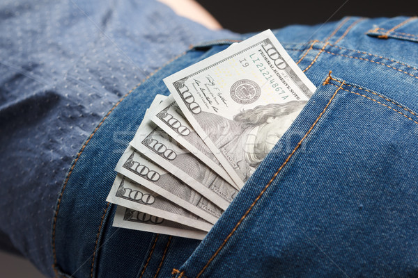 Opakowanie Dolar kobieta dżinsy kieszeni Zdjęcia stock © mrakor