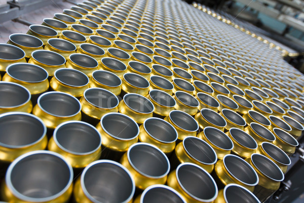 Empty beverage cans on the conveyor belt Stock photo © mrakor