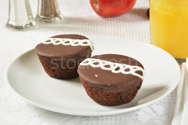 Cream filled chocolate cupcakes Stock photo © MSPhotographic