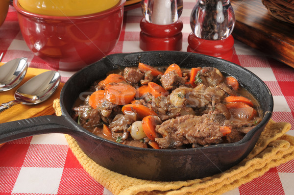 Beef stew in a cast iron skillet Stock photo © MSPhotographic