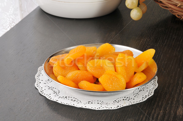Aszalt őszibarackok ezüst szervírozó tál kosár gyümölcs Stock fotó © MSPhotographic