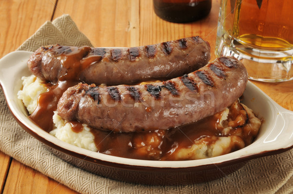 Bangers and mash on a wooden table Stock photo © MSPhotographic