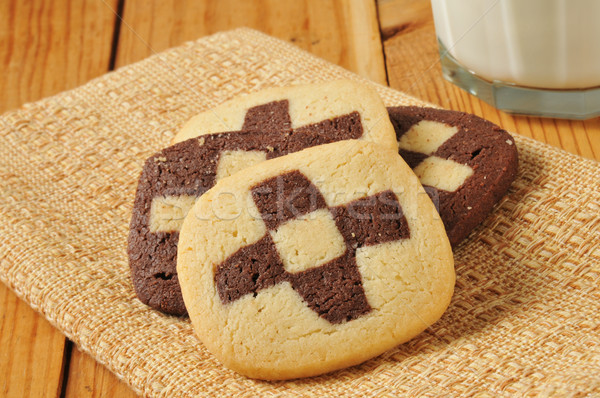 Checker board cookies and milk Stock photo © MSPhotographic