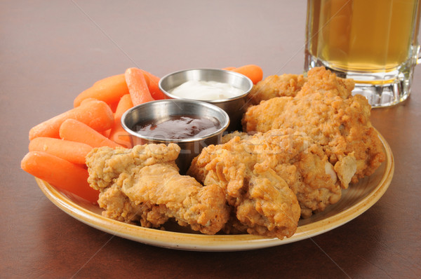 Chicken wings and beer Stock photo © MSPhotographic