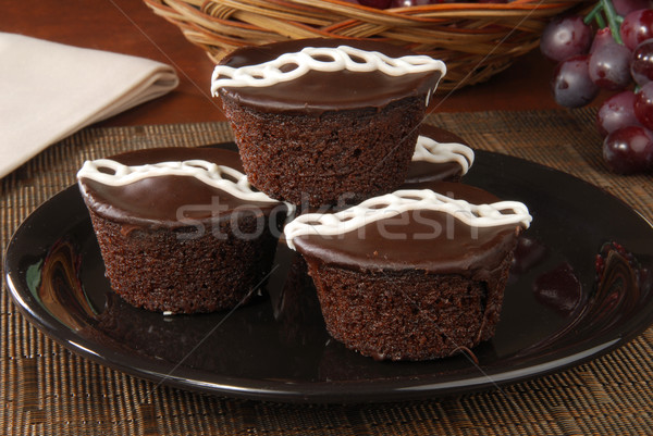 Cream filled chocolate cupcakes Stock photo © MSPhotographic