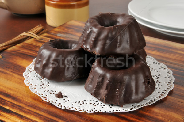 Stack of mini chocolate covered bundt cakes Stock photo © MSPhotographic