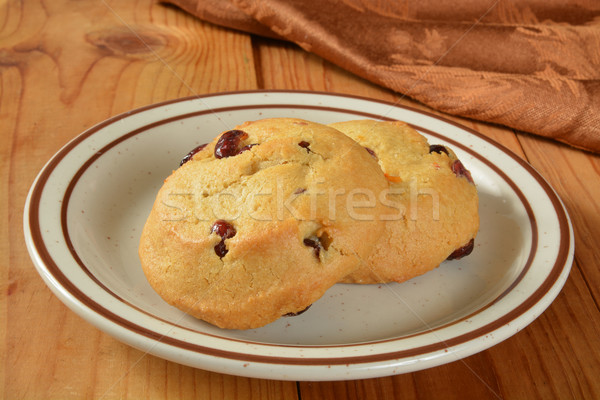 Oranje cookies plaat rustiek houten tafel Stockfoto © MSPhotographic