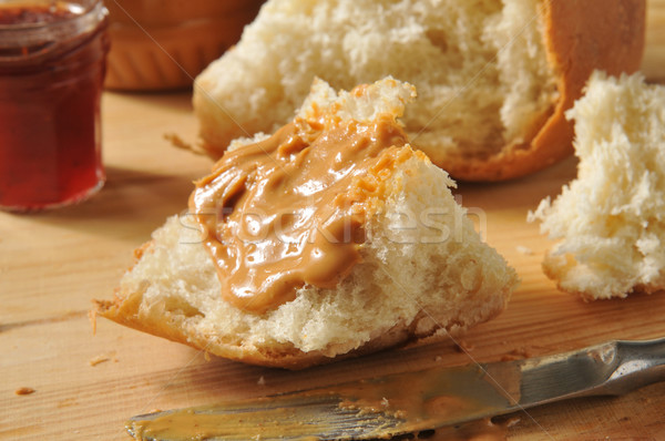 Stock photo: Peanut butter on homemade bread