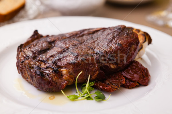Entrecote with grilled garlic Stock photo © mtoome
