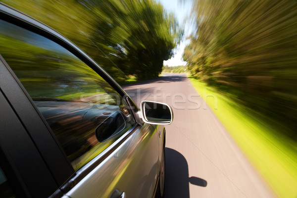 Car driving fast Stock photo © mtoome