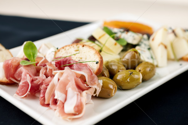 Snack prosciutto olive formaggio tavola pane Foto d'archivio © mtoome