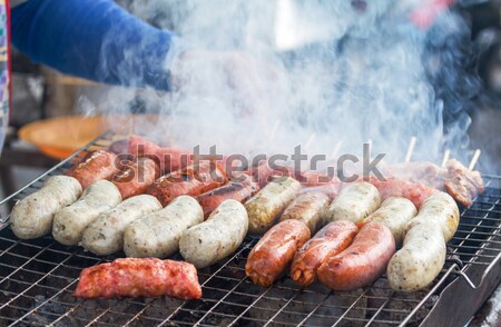 Salsicha fresco quente cães grelhar ao ar livre Foto stock © muang_satun
