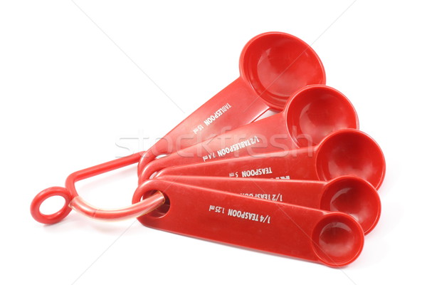 Set of red measuring spoons Stock photo © mybaitshop