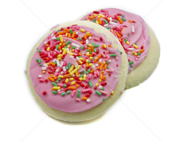 Two pink and sprinkles sugar cookies Stock photo © mybaitshop