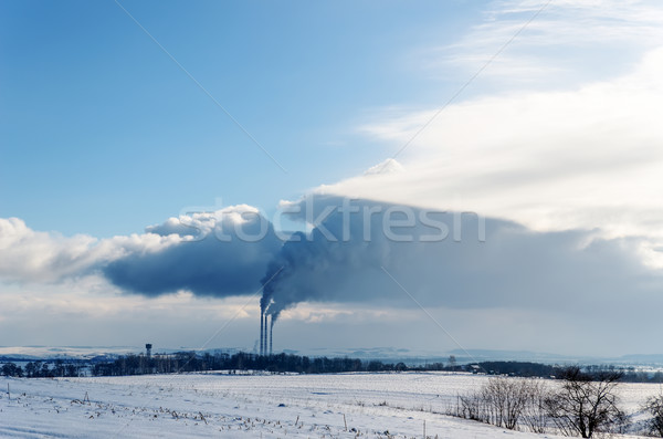 smokestack pollutions in sky. winter time Stock photo © mycola