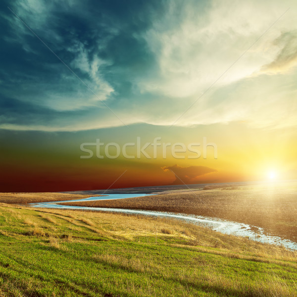 Drámai naplemente folyó fű nap tájkép Stock fotó © mycola