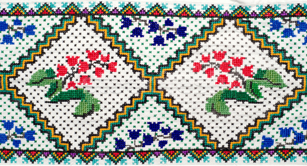 embroidered good by cross-stitch pattern. ukrainian ethnic ornament Stock photo © mycola