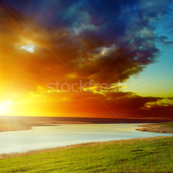 orange sunset over river Stock photo © mycola
