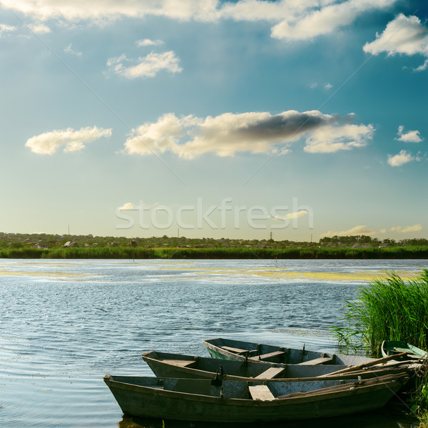 boats on river on sunset time Stock photo © mycola