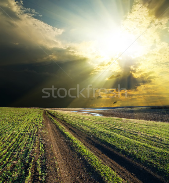 sun and clouds over road Stock photo © mycola