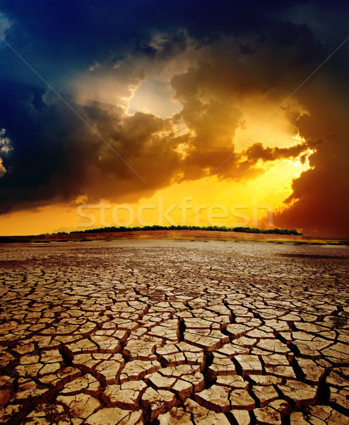 Stockfoto: Dramatisch · zonsondergang · drogen · gebarsten · aarde · textuur