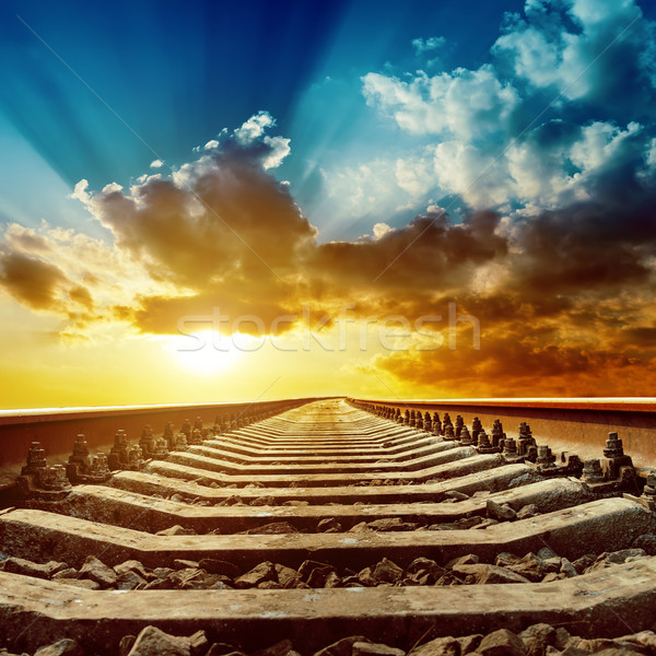 Stock photo: magic sunset over railroad to horizon