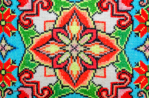 Stock photo: embroidered good by cross-stitch pattern