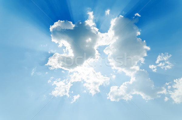 clouds with sunrays on blue sky Stock photo © mycola
