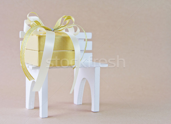 Gift box on the chair Stock photo © myimagine