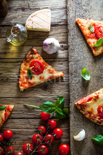 Pizza hout ingrediënten pizza slice kaas tomaten Stockfoto © mythja