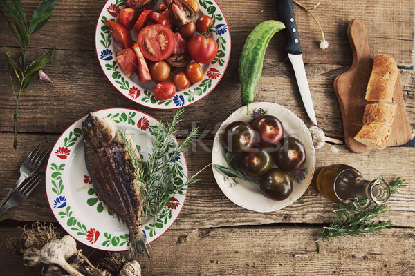 Grilled fish with vegetables Stock photo © mythja