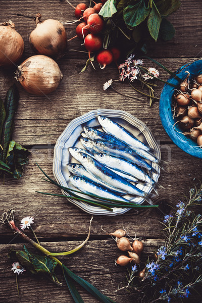 Stock photo: Fresh sardines on wood