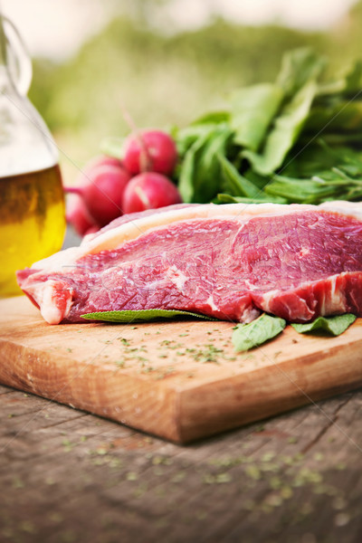 Surowy mięsa świeże warzywa rozmaryn drewna kuchnia Zdjęcia stock © mythja