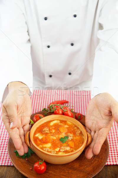 Chef with stew Stock photo © mythja