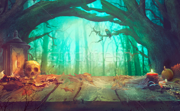 Halloween theme with pumpkins and dark forest. Spooky Halloween  Stock photo © mythja