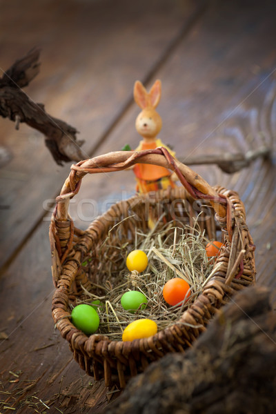 Húsvét dekoráció színes tojások fából készült virág Stock fotó © mythja