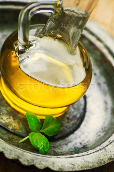 Olive oil and basil Stock photo © mythja