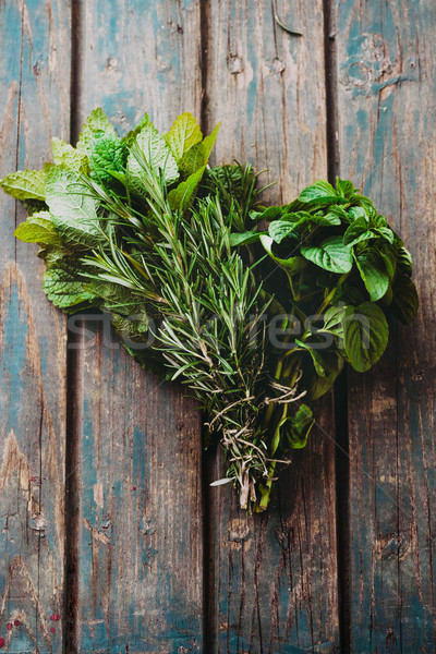 Fresh herbs on table Stock photo © mythja