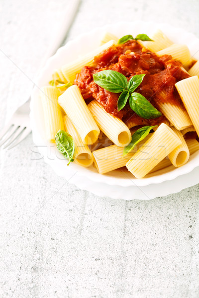 Pasta with tomato sauce Stock photo © mythja
