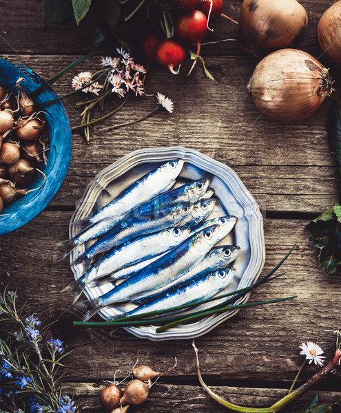 Fresh sardines on wood Stock photo © mythja