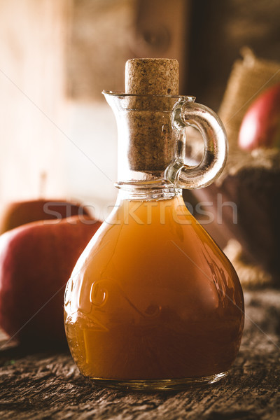 Apple vinegar on wood Stock photo © mythja