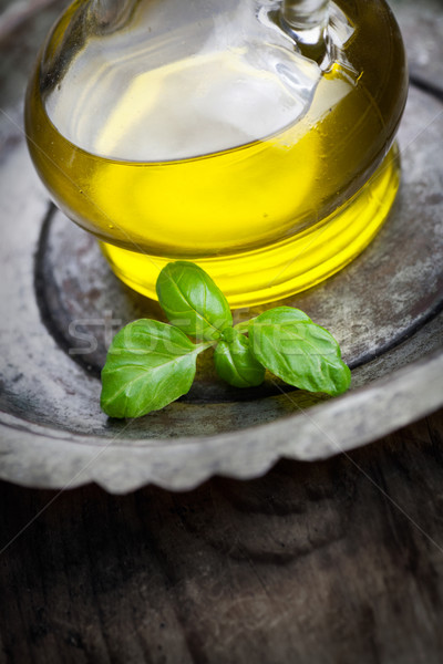 Olive oil and basil Stock photo © mythja