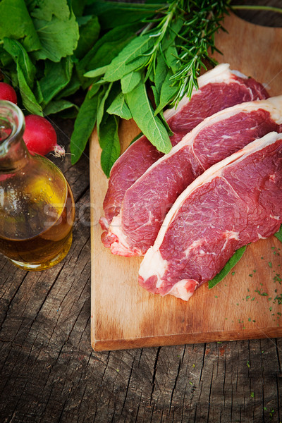 Surowy mięsa świeże warzywa rozmaryn żywności drewna Zdjęcia stock © mythja