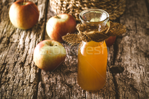 Apple vinegar on wood Stock photo © mythja