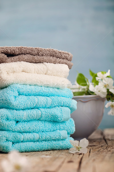 Benessere prodotti spa fiori asciugamani beige Foto d'archivio © mythja
