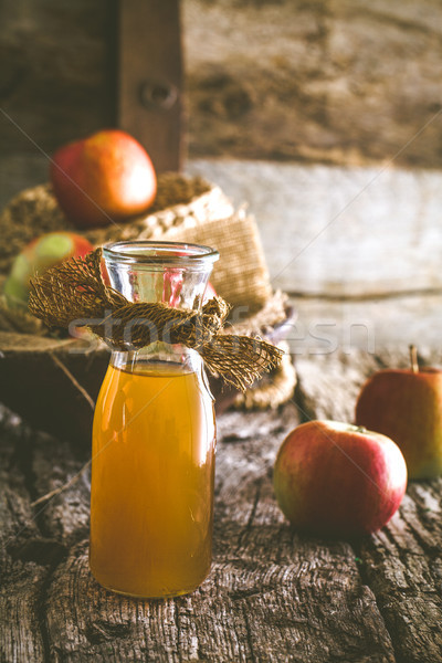 Apple vinegar on wood Stock photo © mythja