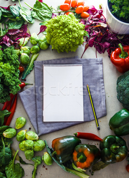 Notebook with vegetables  Stock photo © mythja