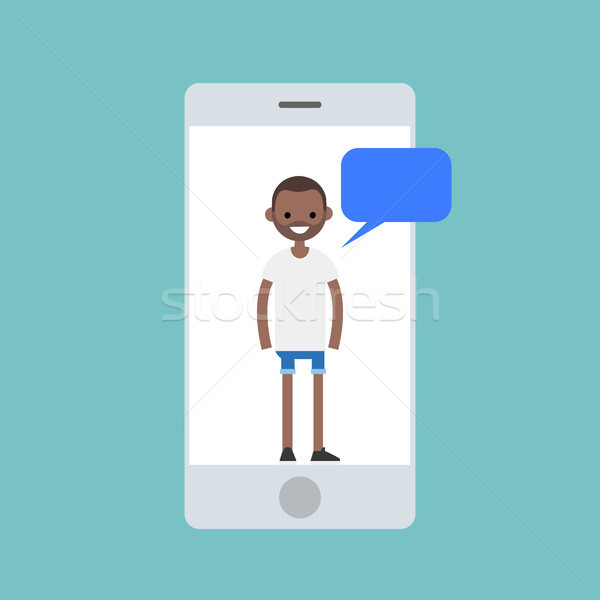 Mobile concept. Young black man chatting on the smart phone's sc Stock photo © nadia_snopek